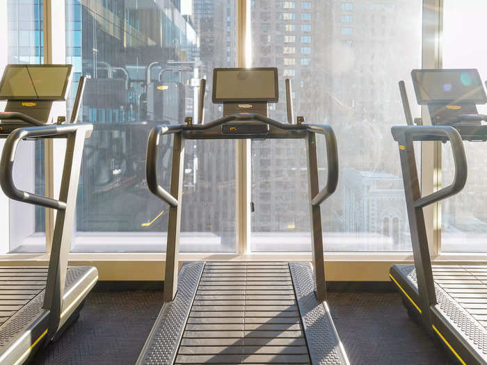 Running on treadmills facing the bustling city would be extra motivating, I thought.