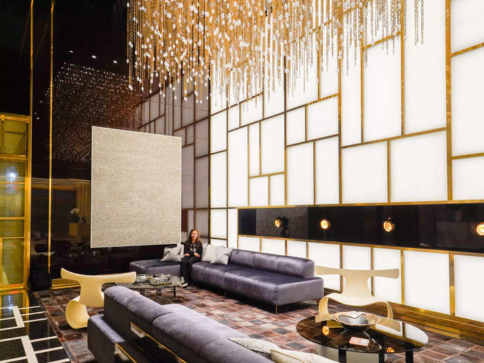 The lobby was full of luxe, gilded details like a giant chandelier and a fur carpet.