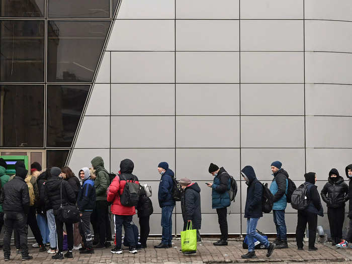 Civilians are queueing to access amenities such as cash machines and supermarkets.