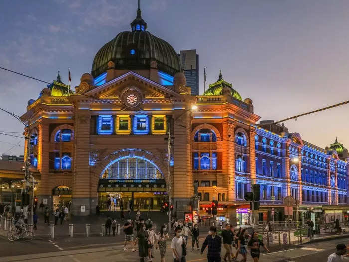 Flinders Street Station in Melbourne, Australia, also featured blue and yellow lights on Thursday.