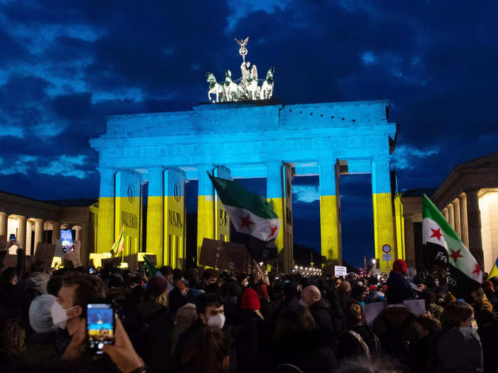 Crowds also gathered at the Brandenburg Gate in Berlin, Germany, in solidarity.