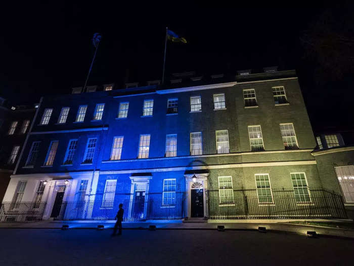 In London, Downing Street was illuminated by blue and yellow lights.