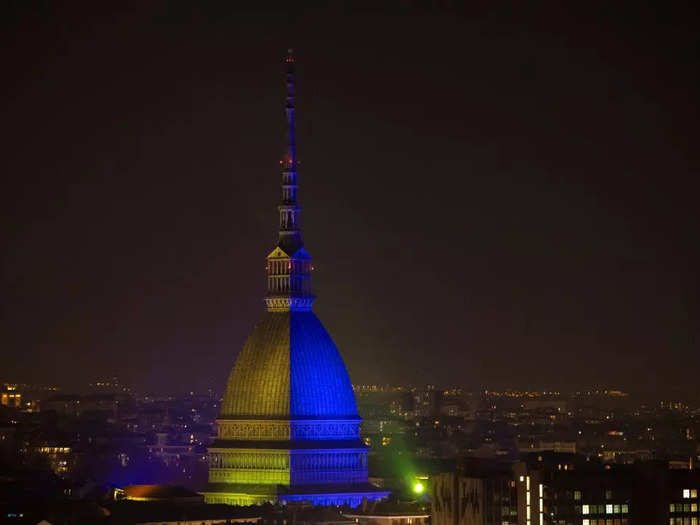 The Mole Antonelliana in Turin, Italy, glowed in blue and yellow Thursday night.