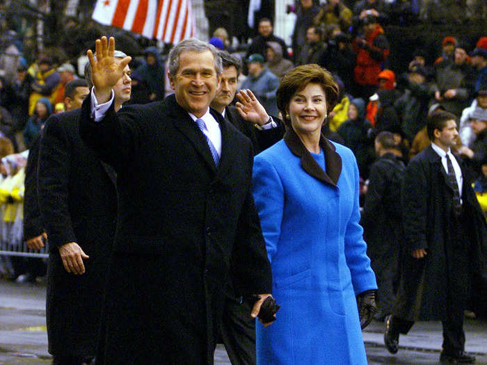 First lady Barbara Bush wore a blue coat reminiscent of her mother-in-law