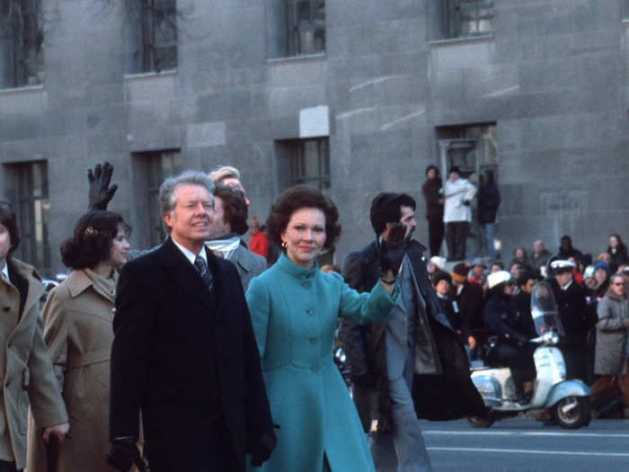 In a transition to a Democratic presidency, first lady Rosalynn Carter was dressed in bright blue.