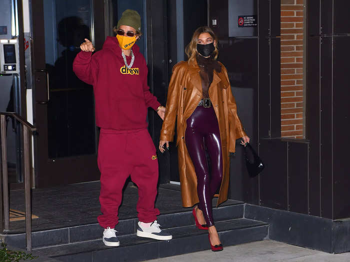 On October 15, 2020, Justin was once again spotted wearing a monochromatic Drew House sweatsuit, while Hailey wore skin-tight plum latex leggings and a camel colored leather trench.