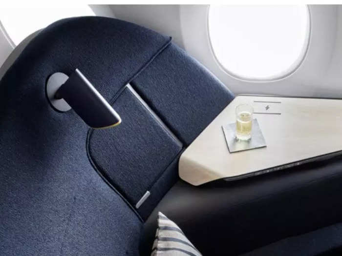 …and different lighting options. Specifically, each seat has a customized lamp that can tailor the ambiance of the space to the passenger. It also doubles as a reading light.