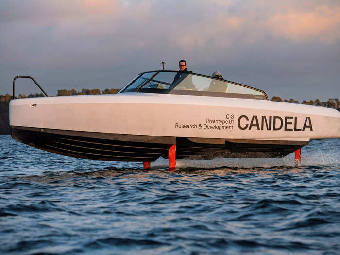 The speedboat glides above the surface of the water on hydrofoils