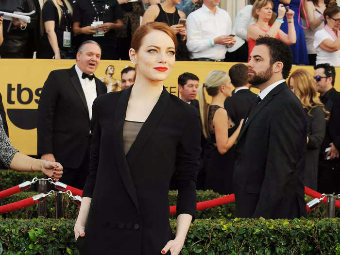 Emma Stone arrived at the 2015 awards show in an all-black Dior look.