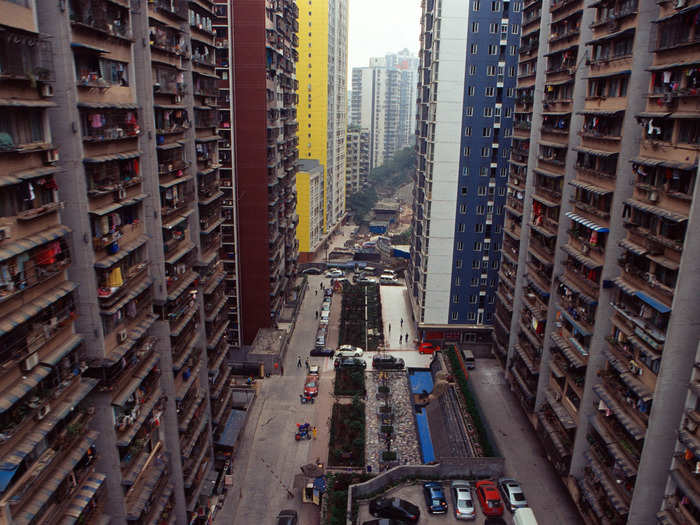 In the mid-2000s, people from the countryside began moving into high-rise apartments in the Chongqing city center, according to a paper by Georgetown University professor Kristen Looney.