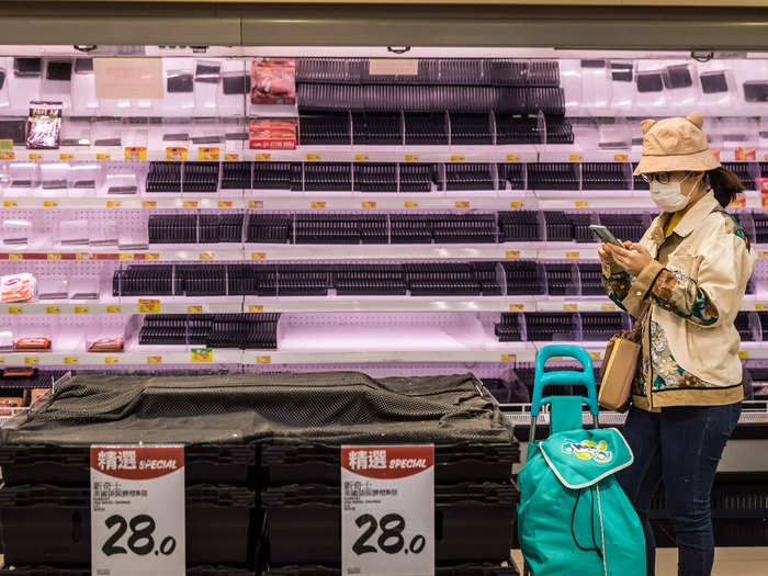 Amid fears of an imminent lockdown, panicked Hong Kong residents flocked to supermarkets on Monday to stock up on groceries, emptying shelves.