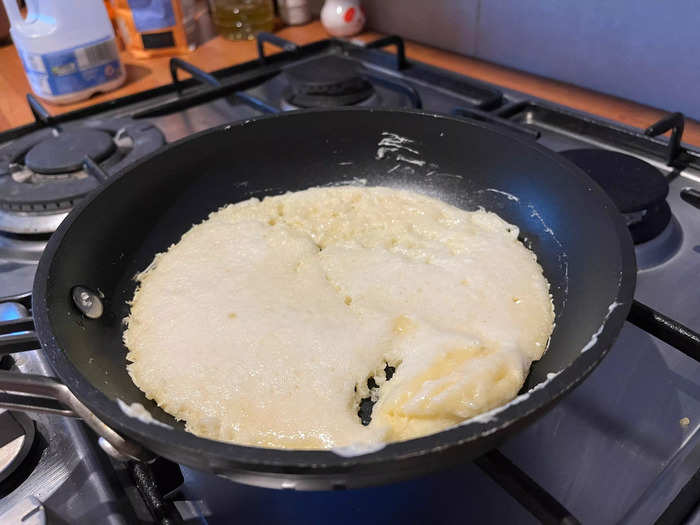 The extra whipped batter made it too delicate, resulting in broken pancakes.