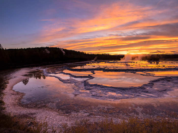 As Yellowstone turns 150 years old, the park and its partners are focused on conservation and historic preservation.