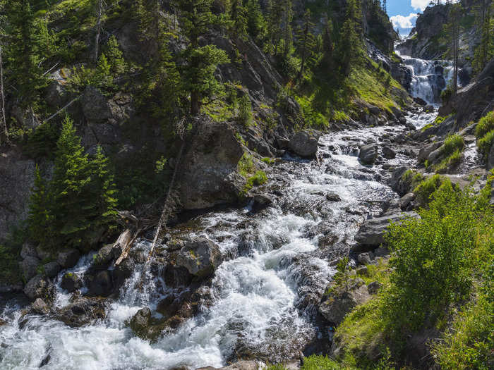 Mystic Falls cascades down 70 feet of ledges on the Little Firehole River.