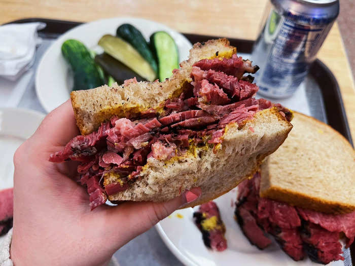 The sandwich came with a slathering of deli mustard on each piece of bread. The pastrami was juicy, unbelievably tender, and fell apart with each bite.