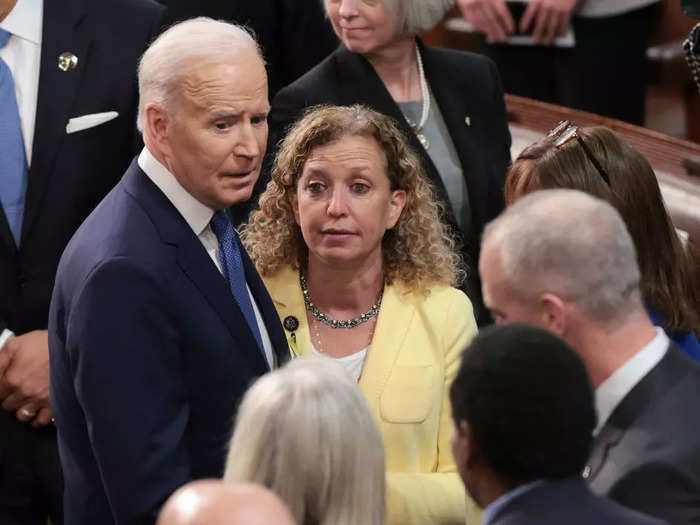 Rep. Debbie Wasserman Schultz of Florida wore a yellow blazer with a blue beaded necklace.