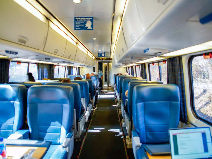 In first-class Acela cars, there are two seats on one side and one seat on the other.