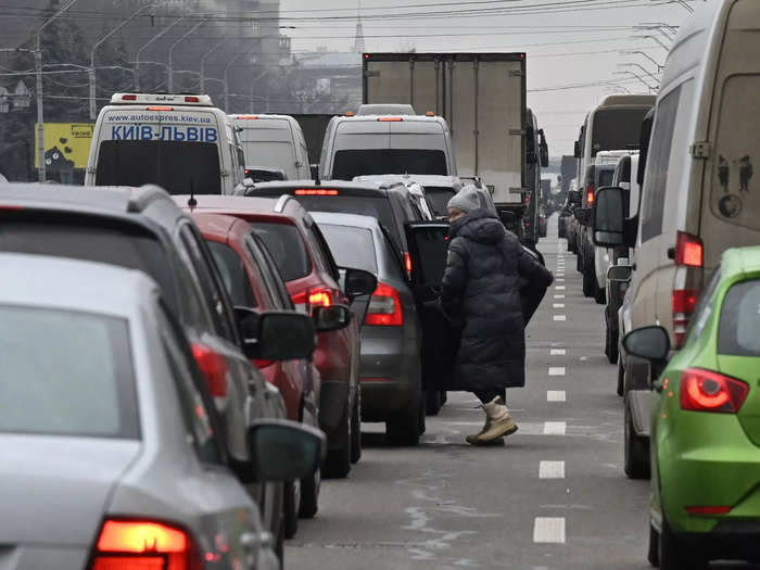 Roads out of the city backed up with long lines of vehicles.