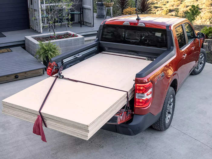 Both cargo areas are designed to fit full-size sheets of plywood in a pinch.