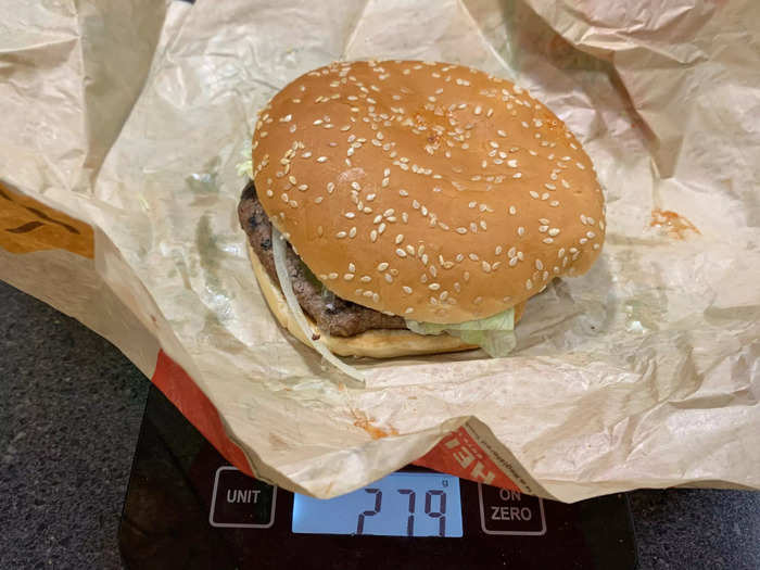 I broke out a food scale to compare items head to head, and the Whopper came out to 279 grams.