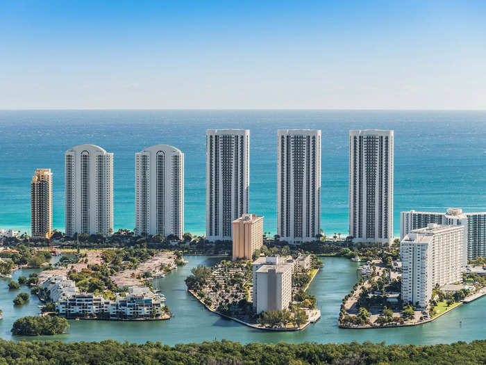 Sunny Isles Beach is a 1.5-mile strip of island that sits between the Atlantic Ocean and Intracoastal Waterway in South Florida. It