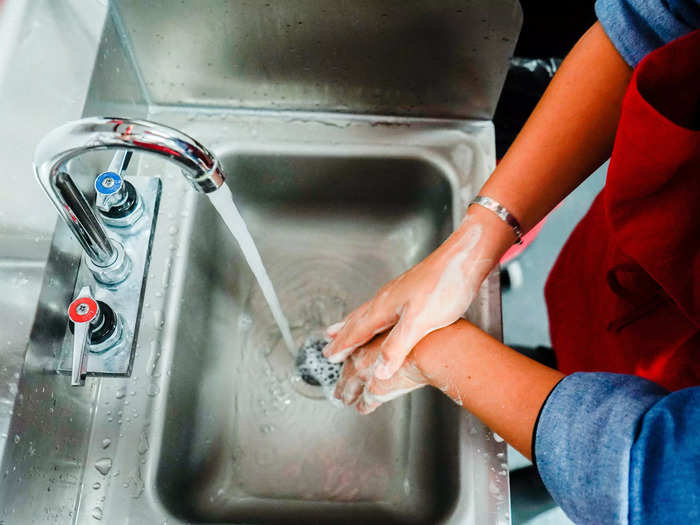 As always, the process starts off with food safety. Employees must wash their hands before starting any new task in the kitchen.