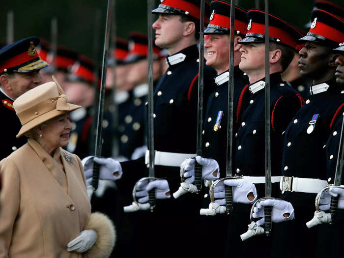 Queen Elizabeth made Prince Harry crack a smile at a military parade in 2006.