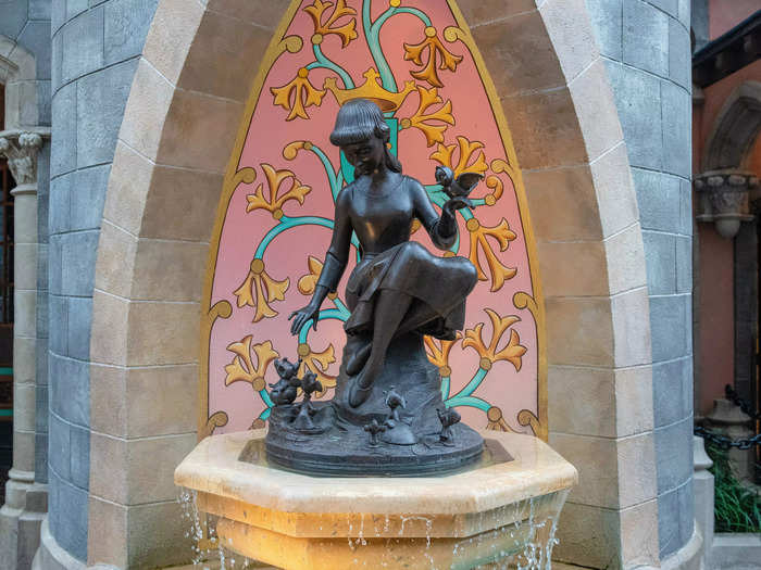 The Cinderella fountain statue is designed to look different to a child than an adult.