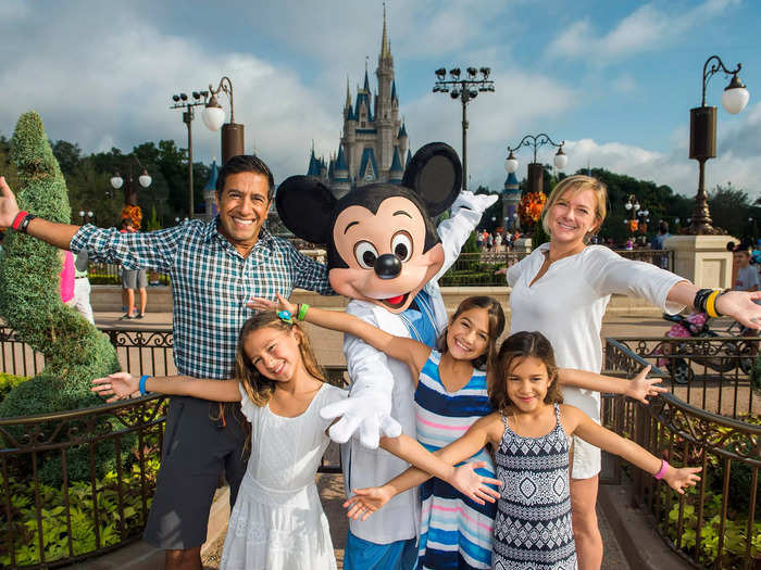 Disney chooses a "family of the day" to open Magic Kingdom every morning.