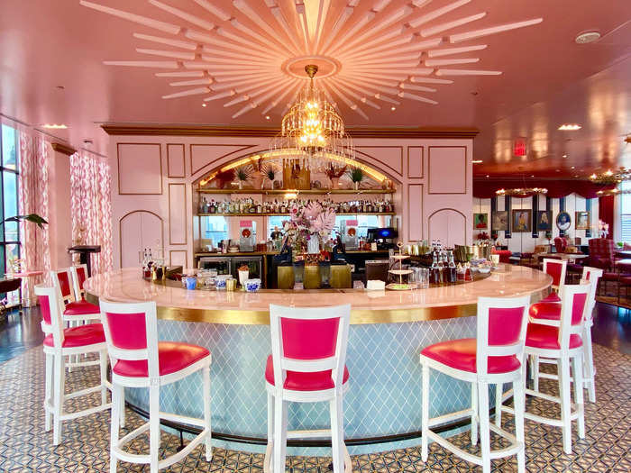 In addition to the pink, shades of white and gold were everywhere, and the interior featured a gorgeous rose onyx bar.