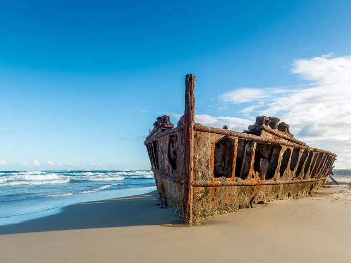 The SS Maheno went from ocean liner to hospital ship to a rusty wreck on Fraser Island, Australia.