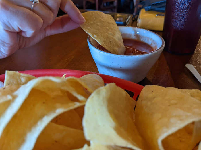 I ordered a taco, of course, and a beef enchilada. My partner ordered the number one, which included a tostada, a taco, and a cheese enchilada. As we waited, a freshly-fried basket of tortilla chips arrived with salsa.