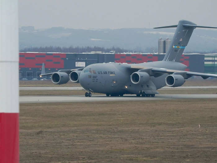 Military aid is arriving at an airfield close to Ukraine