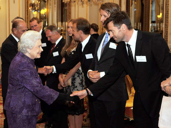 In 2011, Queen Elizabeth greeted Hugh Jackman at Buckingham Palace.