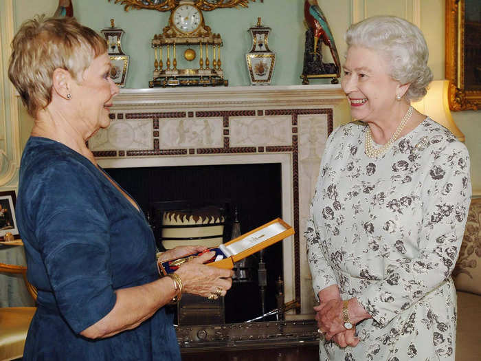 Queen Elizabeth awarded Dame Judi Dench with the Insignia of a Companion of Honour in 2005.