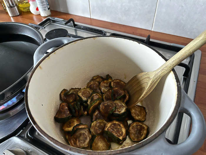 Once the zucchini has rested overnight, add your discs into a pan and start reheating them on medium-low.