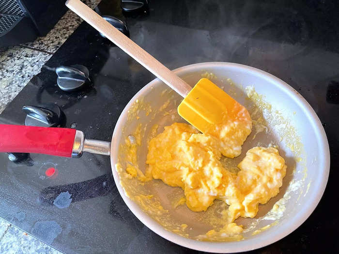 I added my clarified butter to the pan. Once it warmed up, I started cooking my eggs.