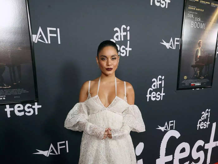 Hudgens then tried a gothic style months later. She attended the "tick, tick…BOOM" premiere in a white lace gown with a plunging neckline, puffed sleeves, and a tiered skirt.