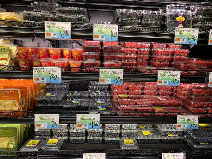 A refrigerated section sits behind the produce, where berries and some pre-cut fruits were also available.