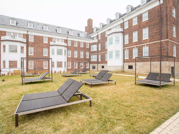 And many of the lounge chairs behind the outdoor pool are paired together, perfect for tanning and napping under the sun with a friend.