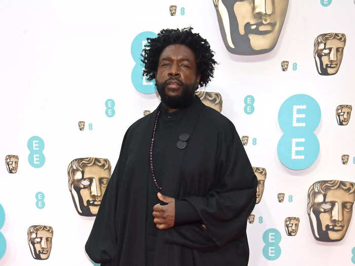 Questlove rocked his Crocs on the red carpet with an all-black look.