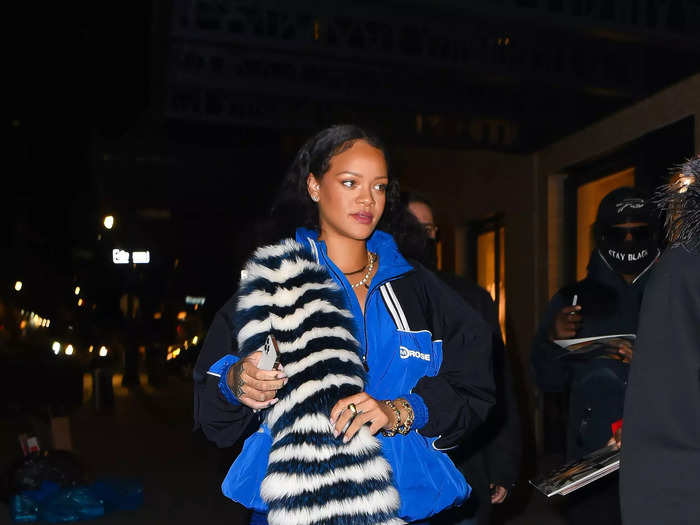 Further into her pregnancy, Rihanna added a Prada fur scarf to her ensemble.