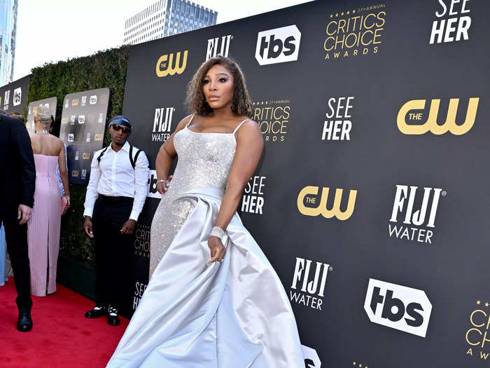 Serena Williams opted for a pearl-gray sequin Atelier Versace gown with a statement train.