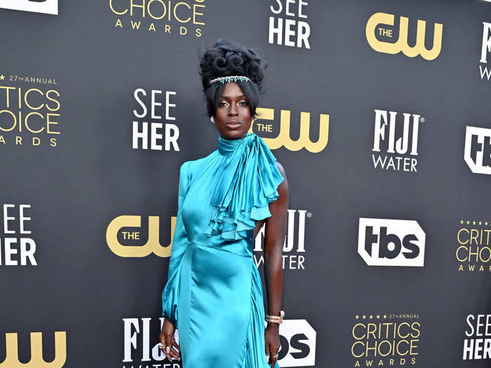 Jodie Turner-Smith wore a flowing silk turquoise gown designed by Gucci.