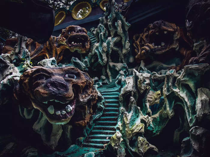 But a gnarly sight awaits inside the caves — this one was full of sculptures of deformed dogs.