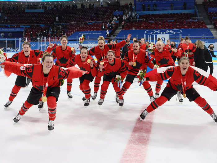 2/17: Team Canada celebrates its gold medal victory over Team USA in the Women