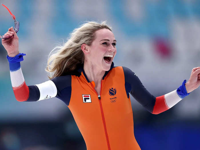 2/10: Irene Schouten of Team Netherlands celebrates after winning the gold medal in a new Olympic record time of 6:43.51 during the Women