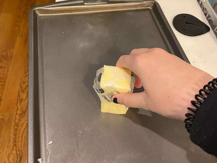 Before putting the dough on the baking pan, I had to butter the pan to prevent sticking.