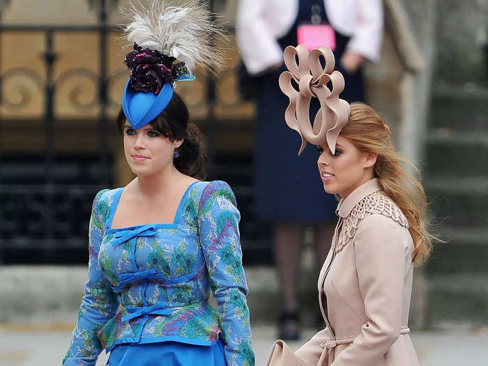 Princess Eugenie and Princess Beatrice faced criticism for their flamboyant hats at Prince William and Kate Middleton