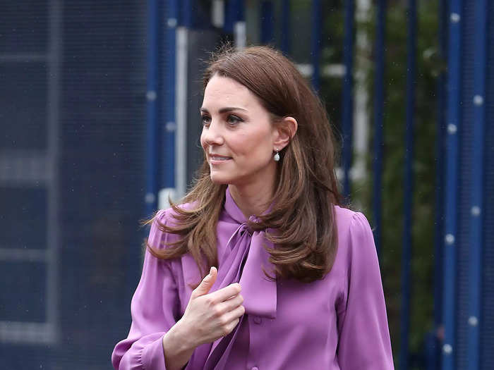Middleton made another fashion faux pas when wore a purple Gucci blouse backward.